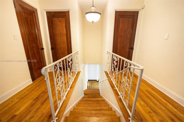 1801 SW 12th St, Miami, FL 33135 - stairs featuring wood finished floors and baseboards