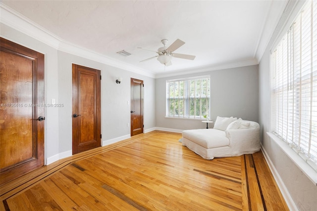 1801 SW 12th St, Miami, FL 33135 - living area featuring light wood-style floors, baseboards, crown molding, and a ceiling fan