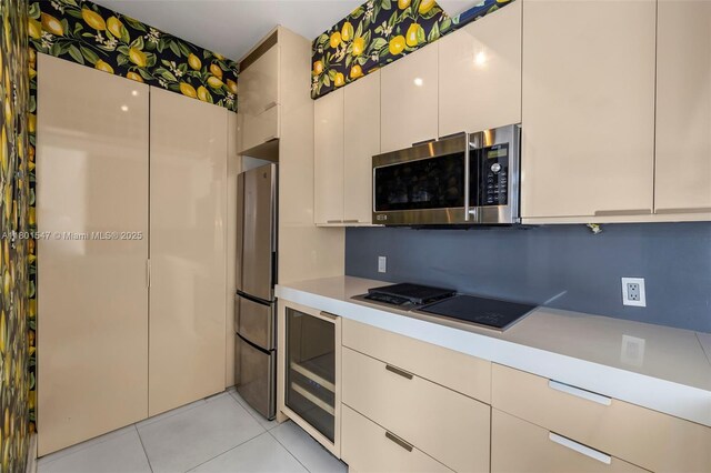 1155 Brickell Bay Dr Unit Ph204, Miami, FL 33131 - kitchen with stainless steel appliances, light countertops, light tile patterned flooring, and modern cabinets