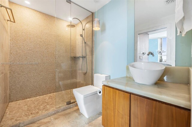 1155 Brickell Bay Dr Unit Ph204, Miami, FL 33131 - full bath with walk in shower, toilet, and vanity