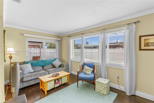 11400 NW 29th Mnr, Sunrise, FL 33323 - living area with dark wood-type flooring, crown molding, and baseboards