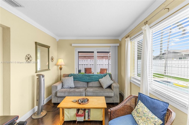 11400 NW 29th Mnr, Sunrise, FL 33323 - living area with wood finished floors, ornamental molding, and baseboards