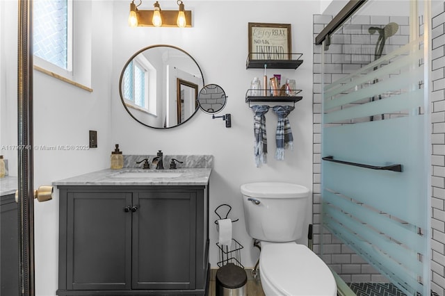 11400 NW 29th Mnr, Sunrise, FL 33323 - bathroom featuring vanity, a shower stall, and toilet