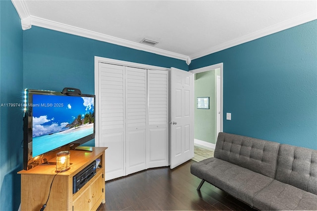 11400 NW 29th Mnr, Sunrise, FL 33323 - sitting room with crown molding, dark wood-style flooring, and baseboards