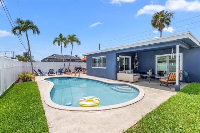11400 NW 29th Mnr, Sunrise, FL 33323 - view of pool featuring a patio, a fenced backyard, and an outdoor living space