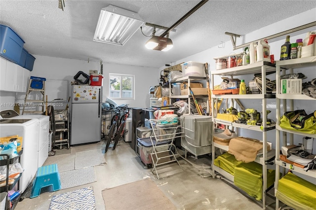 11400 NW 29th Mnr, Sunrise, FL 33323 - garage with freestanding refrigerator, separate washer and dryer, and a garage door opener