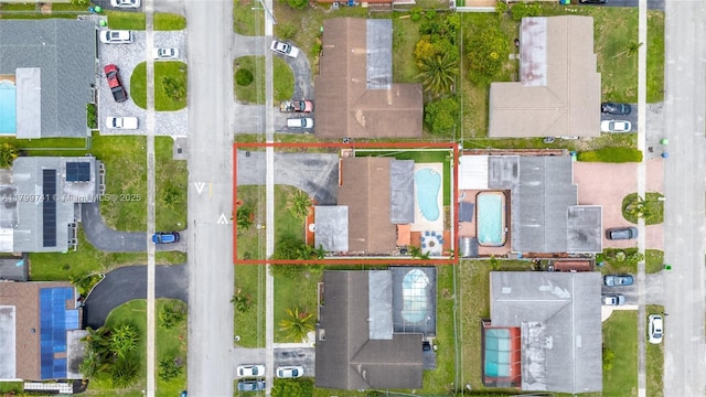 11400 NW 29th Mnr, Sunrise, FL 33323 - aerial view of property and surrounding area with property boundaries highlighted and a pool area