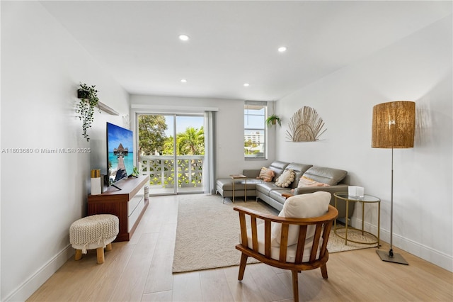 949 Pennsylvania Ave Unit 303, Miami Beach, FL 33139 - living area featuring light wood finished floors, recessed lighting, and baseboards