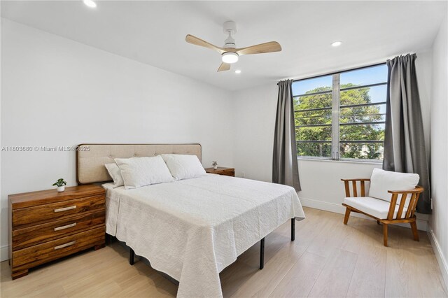949 Pennsylvania Ave Unit 303, Miami Beach, FL 33139 - bedroom featuring light wood-style flooring, recessed lighting, baseboards, and a ceiling fan
