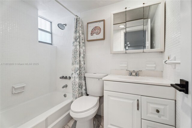 949 Pennsylvania Ave Unit 303, Miami Beach, FL 33139 - bathroom with tile walls, toilet, vanity, and shower / tub combo with curtain
