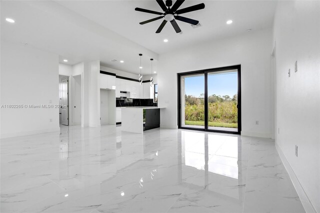 1222 Hibiscus, Lehigh Acres, FL 33972 - unfurnished living room with light marble finish floors, recessed lighting, a ceiling fan, and baseboards