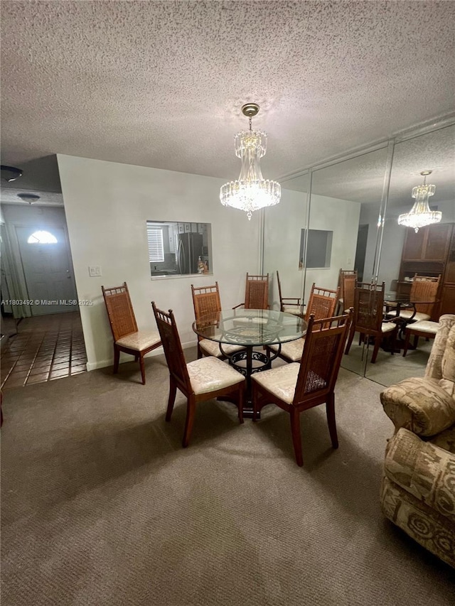 609 S State Road 7 Unit 2H, Margate, FL 33068 - carpeted dining area featuring a chandelier and a textured ceiling