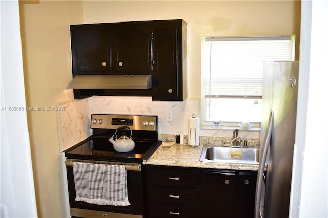 9121 Sunrise Lakes Blvd Unit 201, Sunrise, FL 33322 - kitchen featuring stainless steel appliances, exhaust hood, a sink, and tasteful backsplash