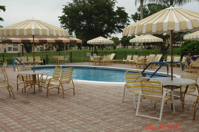 9121 Sunrise Lakes Blvd Unit 201, Sunrise, FL 33322 - community pool with a patio