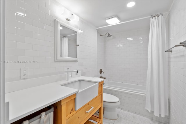 6886 N Kendall Dr Unit D207, Pinecrest, FL 33156 - bathroom with tile patterned flooring, tile walls, tiled shower / bath combo, toilet, and vanity