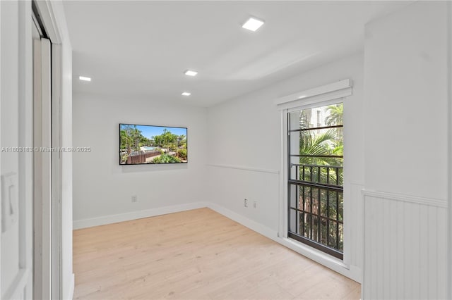 6886 N Kendall Dr Unit D207, Pinecrest, FL 33156 - spare room featuring wood finished floors, baseboards, and recessed lighting