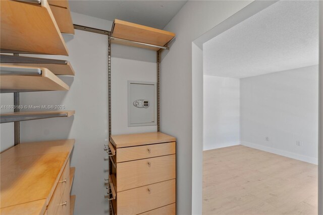 6886 N Kendall Dr Unit D207, Pinecrest, FL 33156 - walk in closet featuring wood finished floors