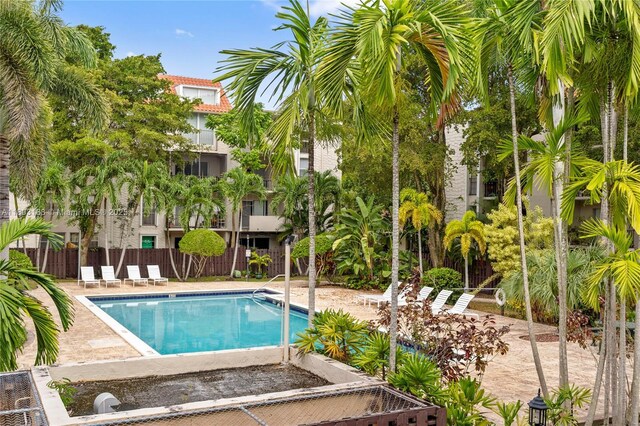 6886 N Kendall Dr Unit D207, Pinecrest, FL 33156 - community pool featuring fence and a patio area