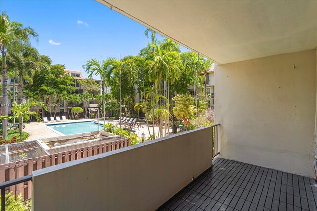 6886 N Kendall Dr Unit D207, Pinecrest, FL 33156 - balcony featuring view of pool area