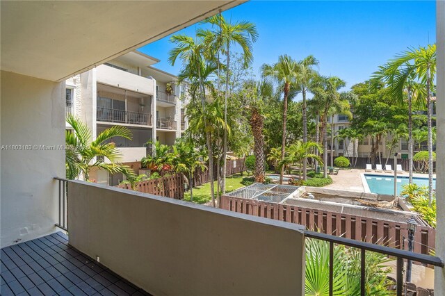 6886 N Kendall Dr Unit D207, Pinecrest, FL 33156 - balcony featuring view of pool