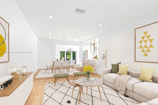 5120 Cherokee Ave, Miami Beach, FL 33140 - living area featuring light wood-type flooring, recessed lighting, and a chandelier