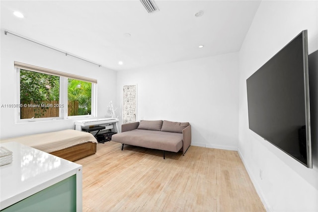 5120 Cherokee Ave, Miami Beach, FL 33140 - living room with light wood-style flooring, recessed lighting, and baseboards