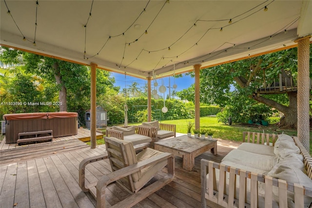 5120 Cherokee Ave, Miami Beach, FL 33140 - wooden deck with a hot tub and an outdoor living space