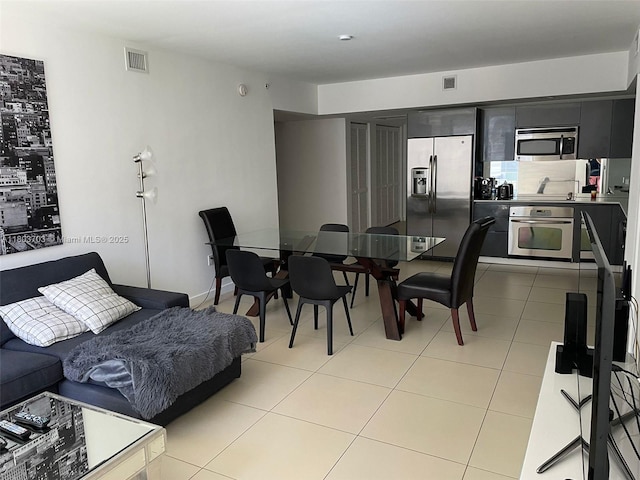 31 SE 6th St Unit 907, Miami, FL 33131 - living room with light tile patterned floors