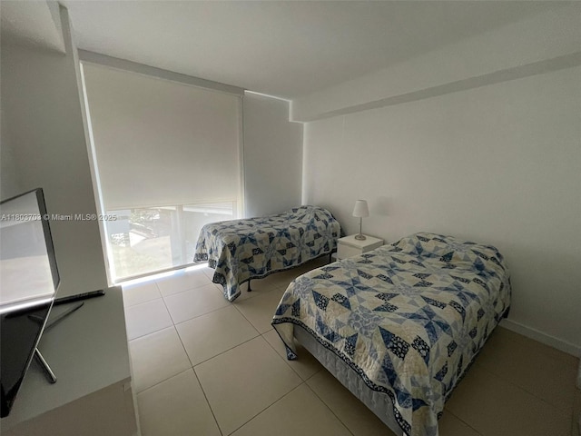 31 SE 6th St Unit 907, Miami, FL 33131 - bedroom featuring tile patterned floors