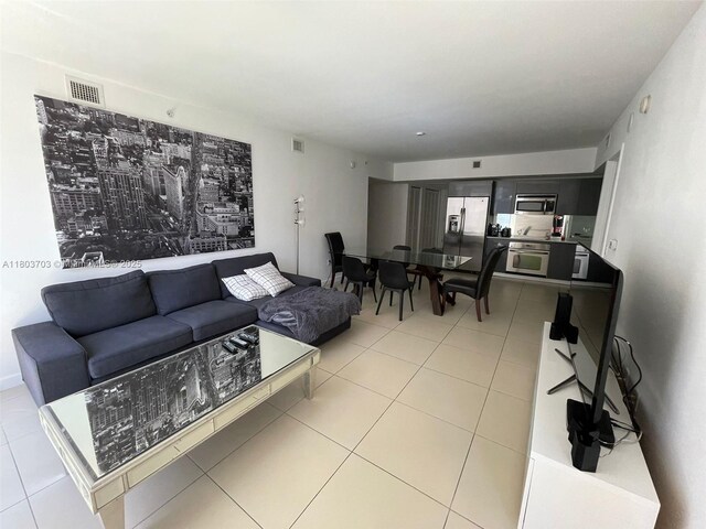 31 SE 6th St Unit 907, Miami, FL 33131 - living area featuring light tile patterned floors