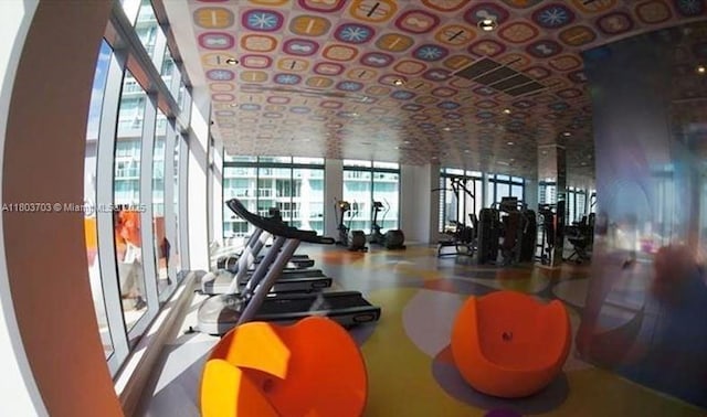 31 SE 6th St Unit 907, Miami, FL 33131 - exercise room featuring plenty of natural light