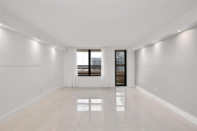 10185 Collins Ave Unit 1502, Bal Harbour, FL 33154 - unfurnished room featuring baseboards, recessed lighting, and tile patterned floors