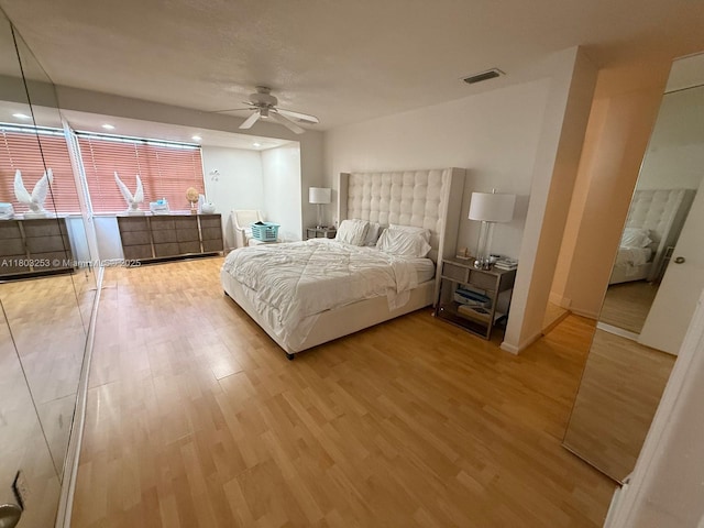 9740 SW 155th Ave, Miami, FL 33196 - bedroom featuring wood finished floors, a ceiling fan, and recessed lighting