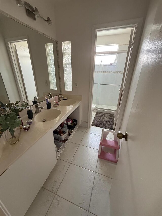 9740 SW 155th Ave, Miami, FL 33196 - full bathroom featuring a stall shower and double vanity