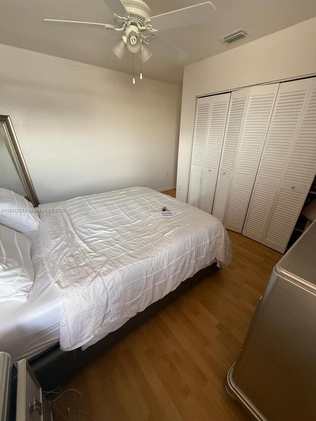 9740 SW 155th Ave, Miami, FL 33196 - bedroom with wood finished floors, a closet, and ceiling fan