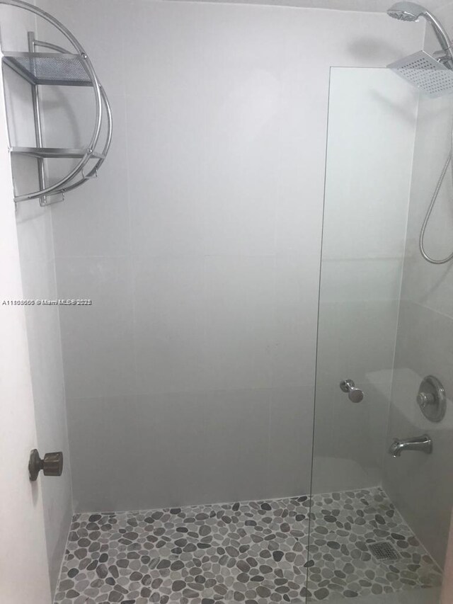 250 180th Dr Unit 108, Sunny Isles Beach, FL 33160 - full bathroom with a tile shower