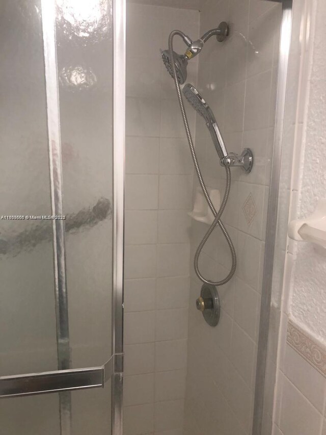 250 180th Dr Unit 108, Sunny Isles Beach, FL 33160 - bathroom with a shower stall