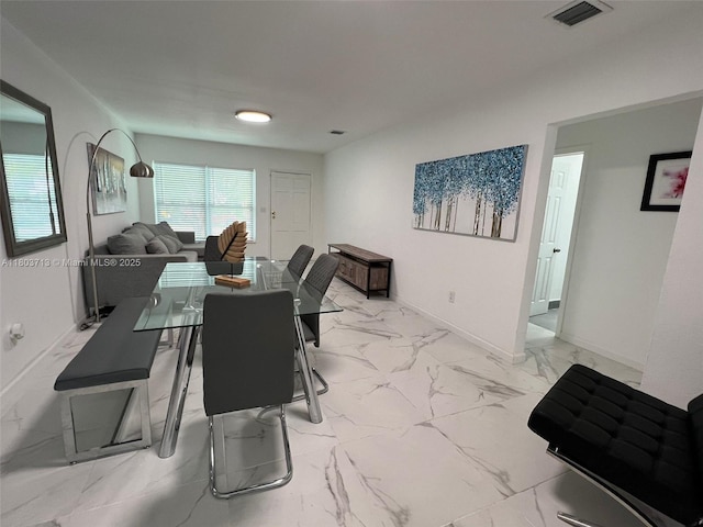 1472 NE 150th St, Miami, FL 33161 - dining area with marble finish floors and baseboards
