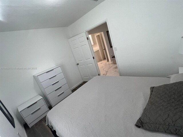 1472 NE 150th St, Miami, FL 33161 - bedroom with marble look tile flooring