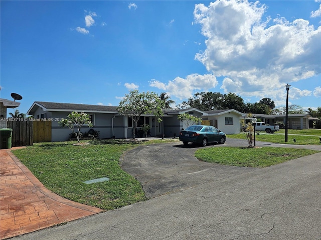 8240 NW 15th St, Pembroke Pines, FL 33024 - ranch-style home with stucco siding and curved driveway