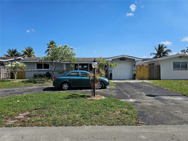 8240 NW 15th St, Pembroke Pines, FL 33024 - single story home with driveway, a garage, and stucco siding