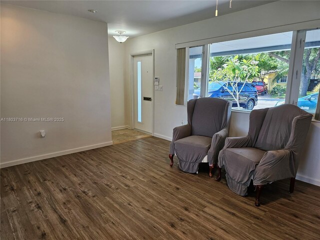 8240 NW 15th St, Pembroke Pines, FL 33024 - sitting room with wood finished floors, healthy amount of natural light, and baseboards