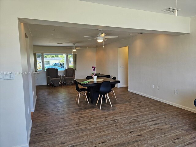 8240 NW 15th St, Pembroke Pines, FL 33024 - dining space featuring dark wood-style floors, baseboards, and a ceiling fan