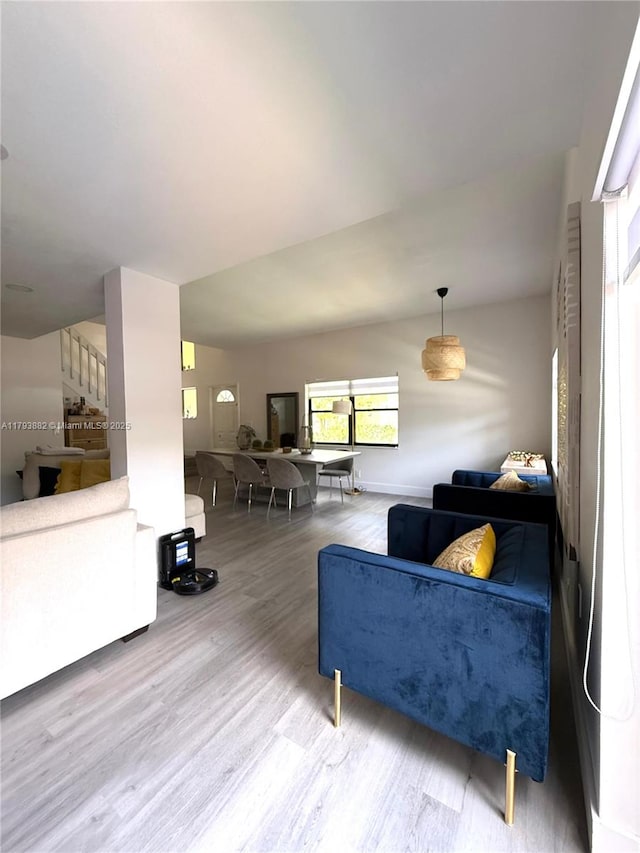 513 Racquet Club Rd Unit 56, Weston, FL 33326 - living room with wood finished floors and stairway