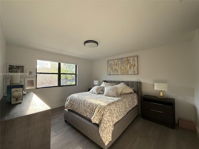 513 Racquet Club Rd Unit 56, Weston, FL 33326 - bedroom featuring wood finished floors and baseboards
