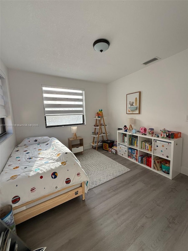 513 Racquet Club Rd Unit 56, Weston, FL 33326 - bedroom with wood finished floors