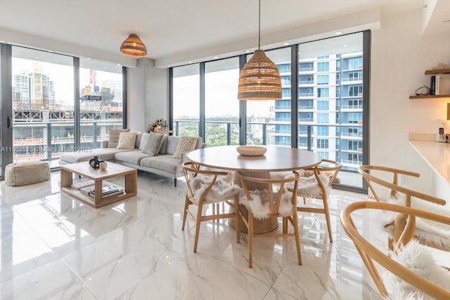 1300 S Miami Ave Unit 2006, Miami, FL 33130 - dining area with a city view, floor to ceiling windows, and light marble finish flooring