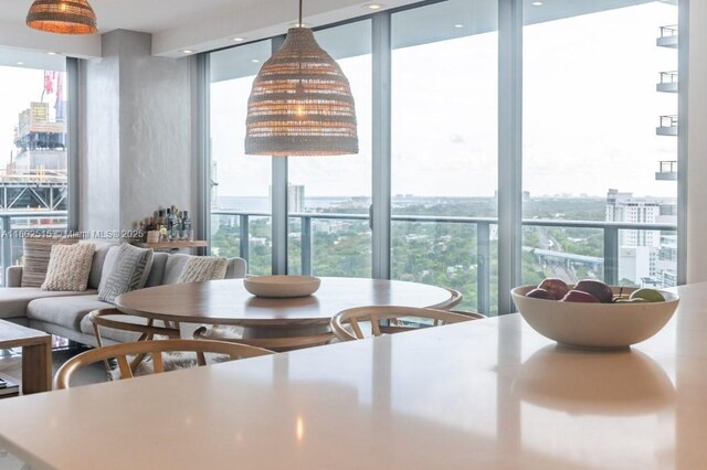 1300 S Miami Ave Unit 2006, Miami, FL 33130 - dining space featuring a view of city and floor to ceiling windows