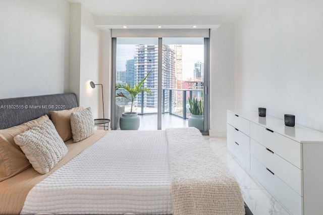 1300 S Miami Ave Unit 2006, Miami, FL 33130 - bedroom with access to outside, light marble finish flooring, a view of city, and a wall of windows