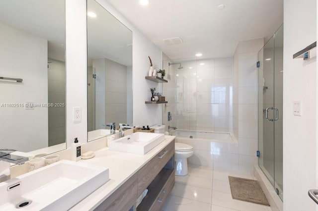 1300 S Miami Ave Unit 2006, Miami, FL 33130 - bathroom with tile patterned floors, toilet, double vanity, and recessed lighting